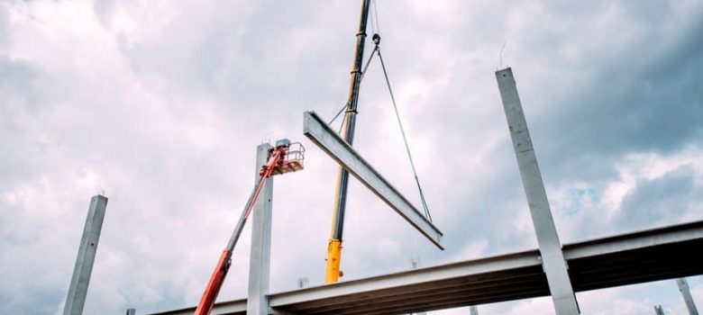 Crane lifting concrete frameworks, shutterings and heavy prefabricated concrete components